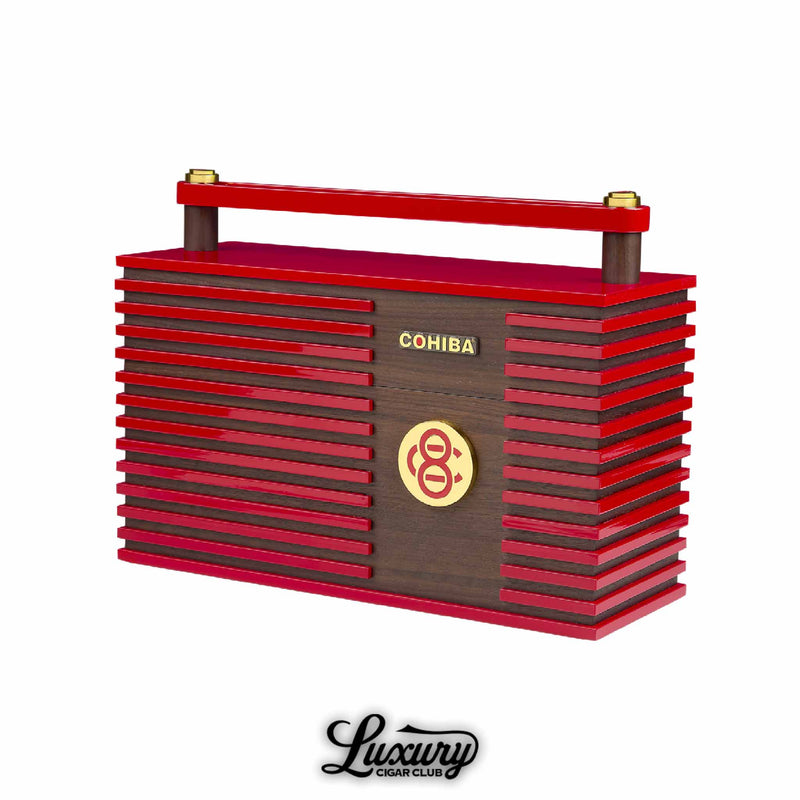 Luxury Cigar Club product photo of the limited edition Cohiba C8 Churchill humidor box showing the red lacquer and walnut wood case with gold Cohiba badge and C8 emblem front and center.