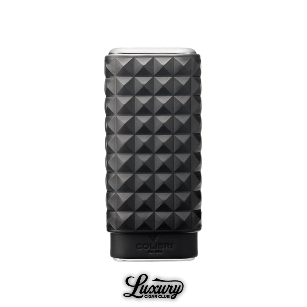 Luxury Cigar Club Colibri Quasar triple cigar case in matte black with geometric pyramid design standing upright