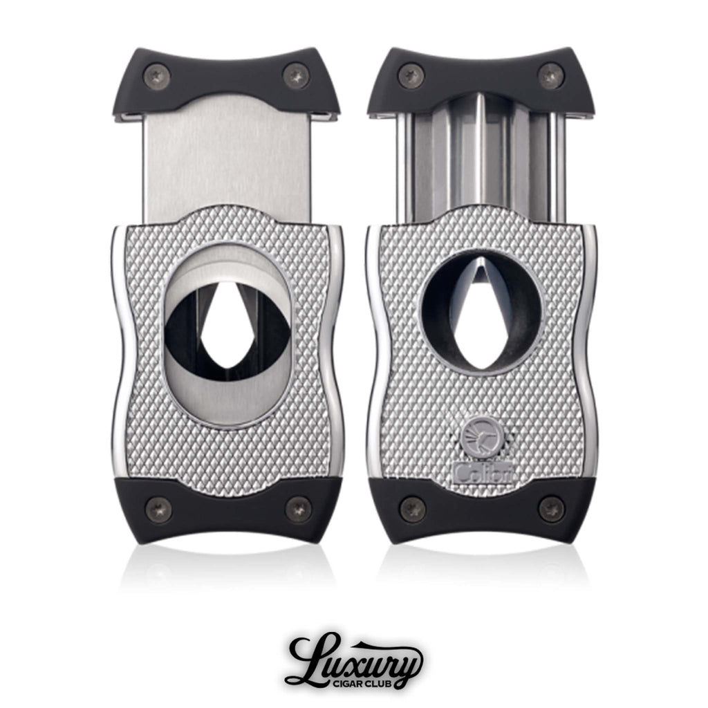 Dual-blade Colibri SV cigar cutter in polished chrome finish shown open with V-cut and straight cut options, displayed on white background with Luxury Cigar Club logo.