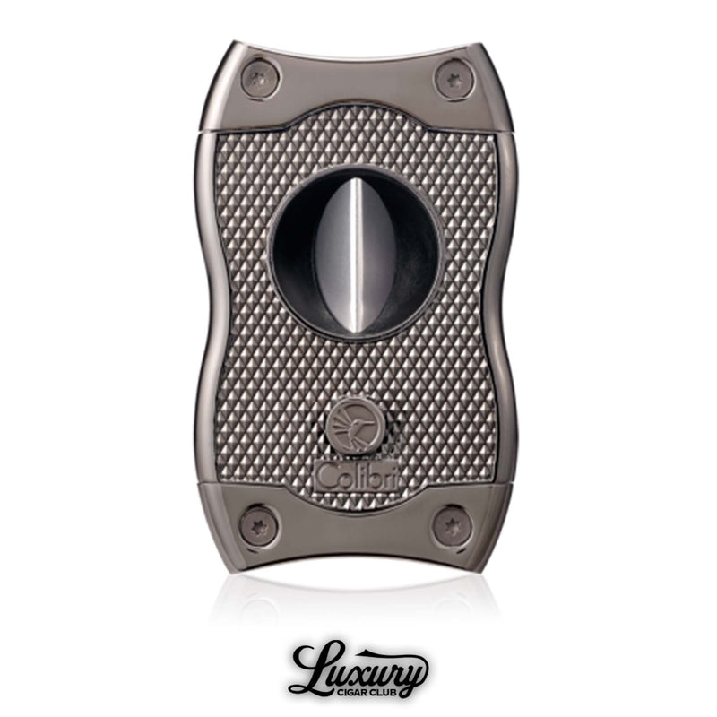 Gunmetal Colibri SV cigar cutter with dual-purpose V-cut and straight cut system, textured grip finish, shown with Luxury Cigar Club logo.