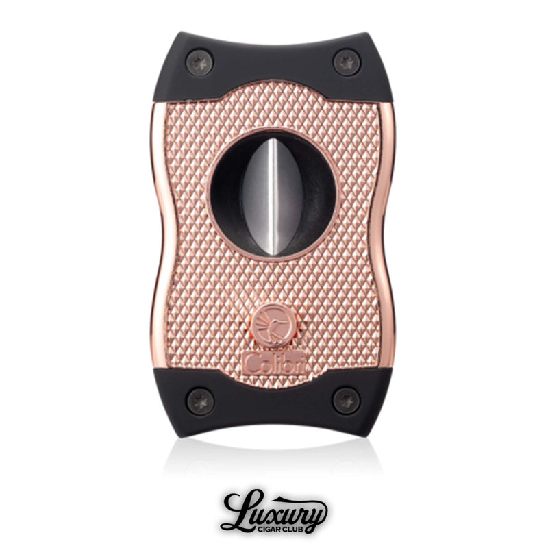 Colibri SV cigar cutter in rose gold finish with diamond-pattern grip and dual V-cut and straight cut options, Luxury Cigar Club logo visible.