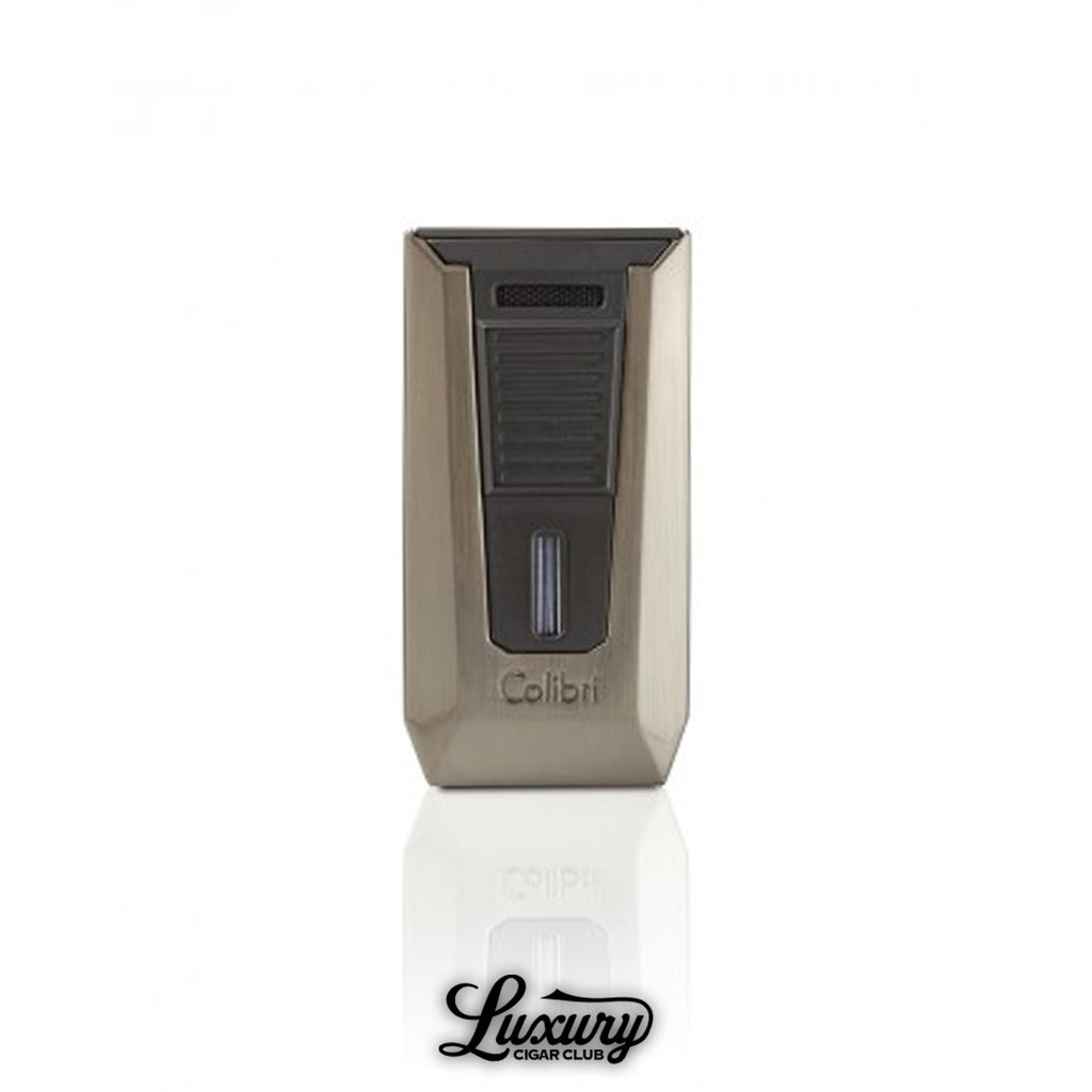 Colibri Slide double jet flame lighter in sleek gunmetal finish with dual jet torches.
