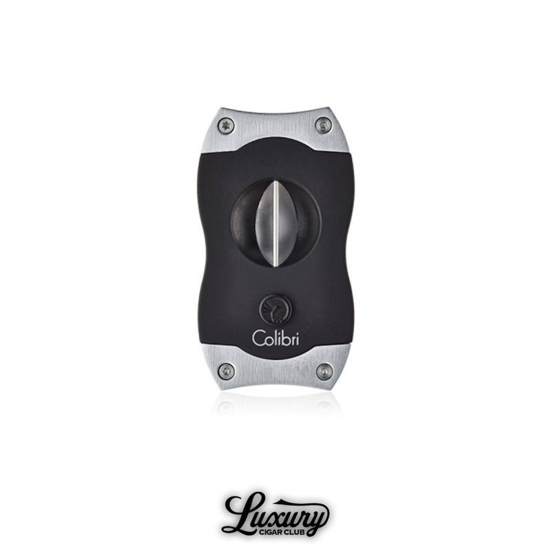 Polished Colibri V-Cut cigar cutter in black with chrome accents, designed with a modern edge and stainless steel V-blade, shown with Luxury Cigar Club logo.