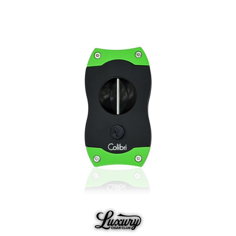 Unique Colibri V-Cut cigar cutter in black with green accents, strong and stylish cigar accessory with sharp V-blade, featured alongside Luxury Cigar Club logo.