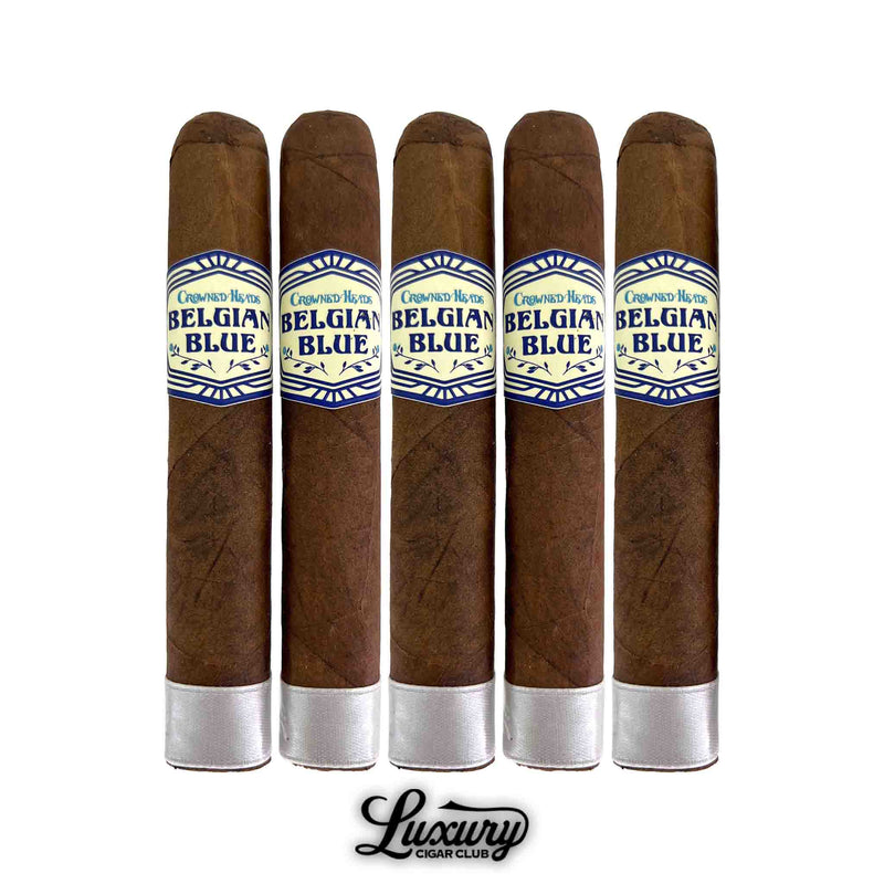 Five Crowned Heads Belgian Blue Limited Edition 2025 Double Robusto BP cigars standing upright side by side on a white background. Each cigar has a medium-brown wrapper, Belgian Blue primary band with blue detailing, and a silver foot band. Luxury Cigar Club watermark centered below.