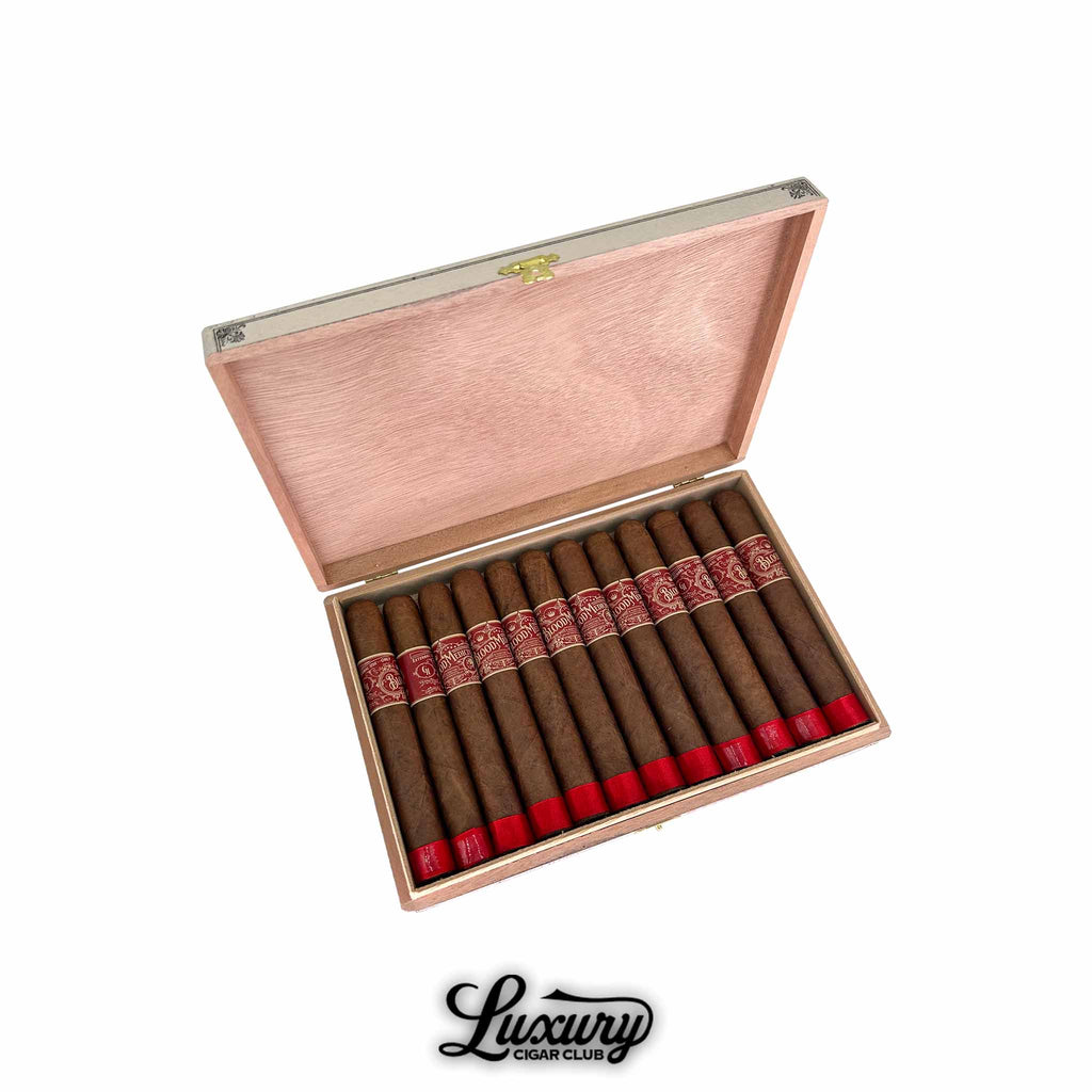 Crowned Heads Blood Medicine B Positive Limited Edition Toro cigars box open with 14 cigars inside at Luxury Cigar Club