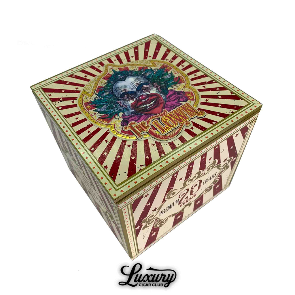 Danli Honduras Tobacco The Clown Corojo Barber Pole cigar box featuring bold carnival-inspired artwork with a colorful clown design, presented by Luxury Cigar Club.