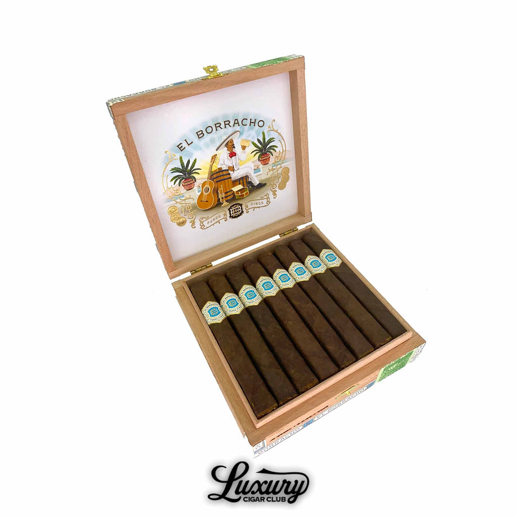 Open cedar cigar box of Dapper El Borracho Connecticut Broadleaf cigars displayed for sale online at Luxury Cigar Club, showing dark brown premium cigars with blue and gold bands lined neatly inside box with ornate El Borracho interior artwork