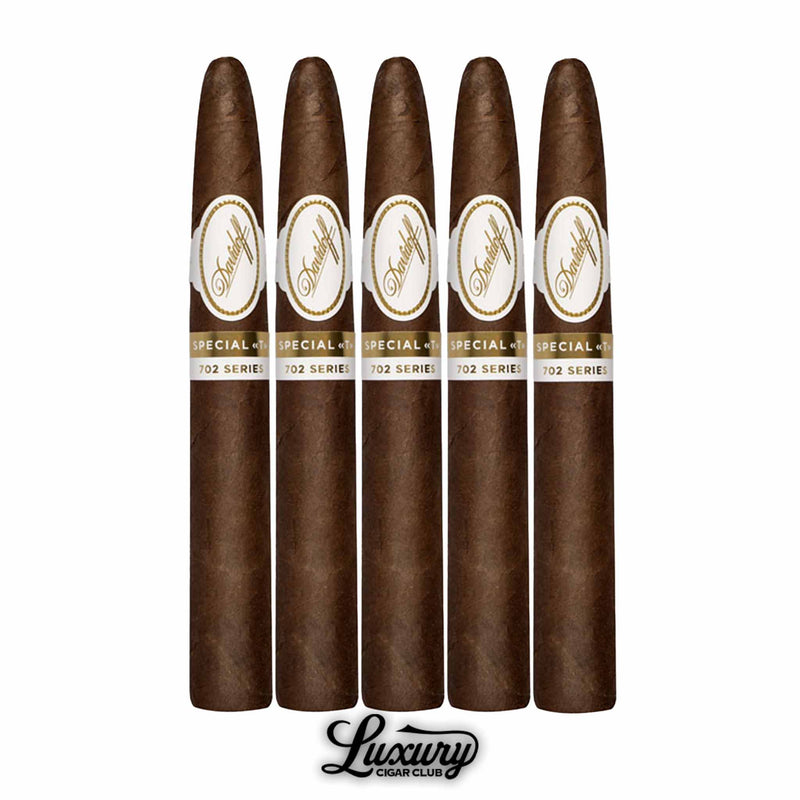 Davidoff 702 Series Aniversario Special T cigars 5 pack, featuring elegant torpedo shape with Ecuadorian 702 wrapper and white and gold Davidoff bands, displayed with Luxury Cigar Club logo.