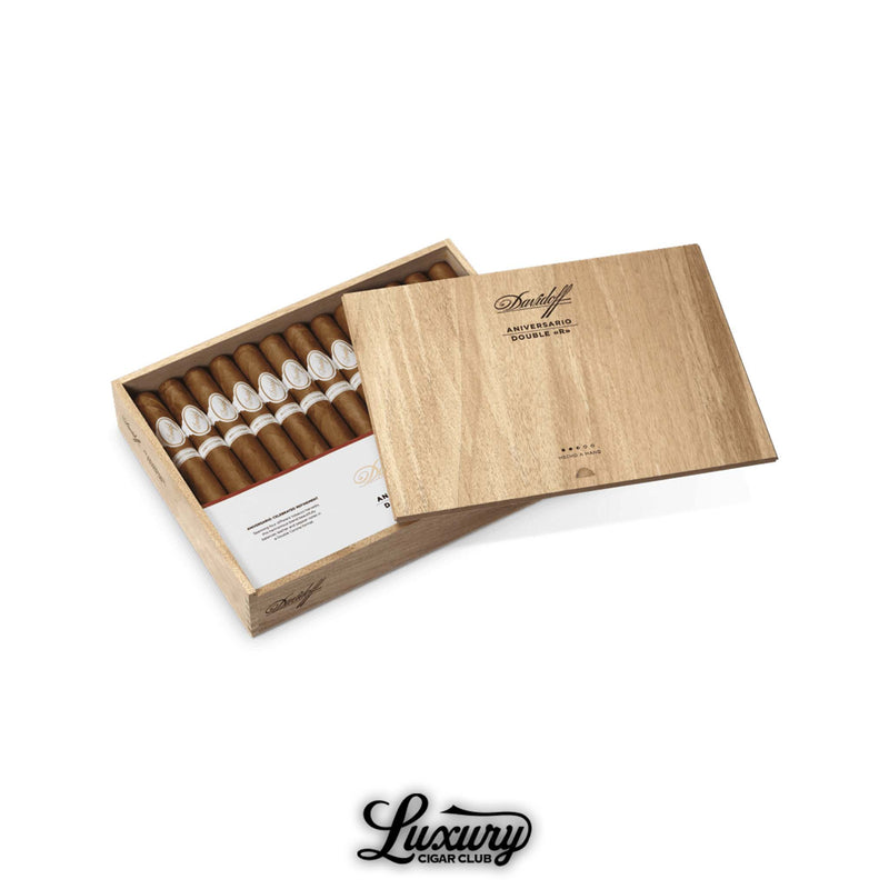 Davidoff Aniversario Double R cigars in a light wooden box, showcasing large cigars with white and gold bands.