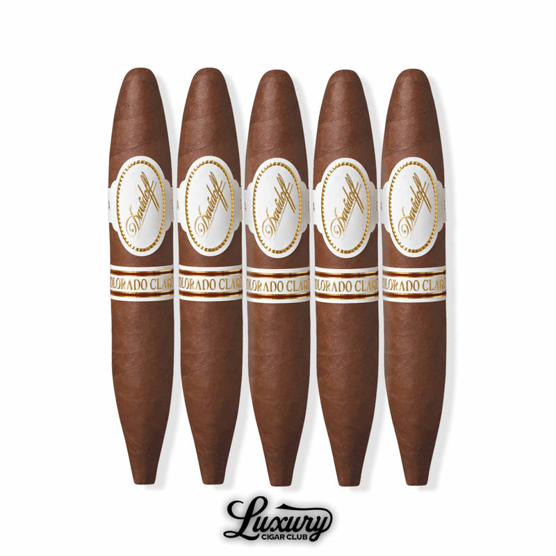 Five Davidoff Colorado Claro Short Perfecto cigars with double-tapered figurado shape, evenly dark wrapper, detailed white-and-gold Davidoff bands, shown in row with Luxury Cigar Club logo.