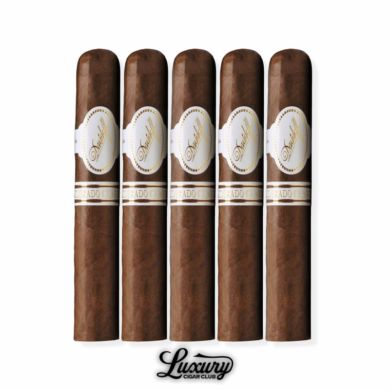 Five Davidoff Colorado Claro Special «R» cigars with round parejo format, medium brown wrapper, white-and-gold Davidoff bands, displayed upright with Luxury Cigar Club logo.