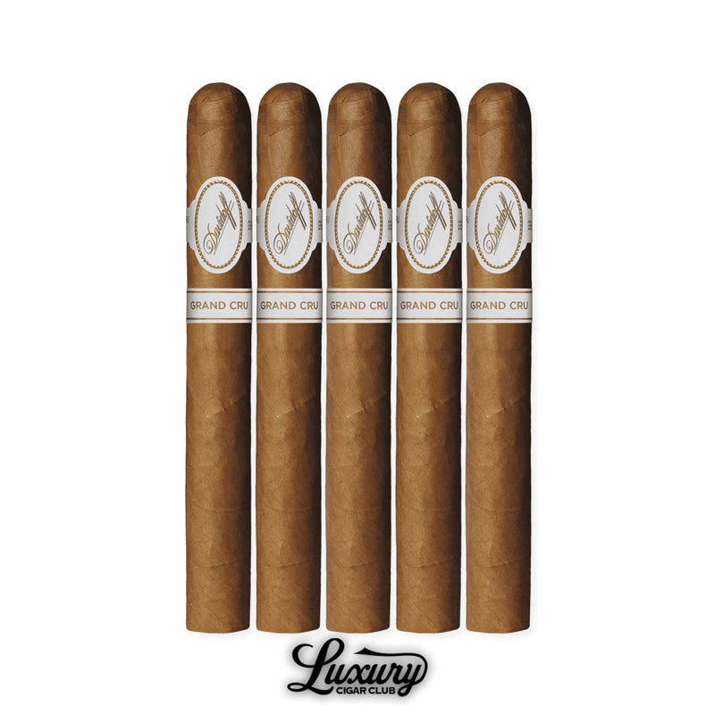 Five Davidoff Grand Cru No. 2 cigars arranged vertically, light brown wrapper, traditional white and gold Davidoff Grand Cru bands, image includes the Luxury Cigar Club logo.