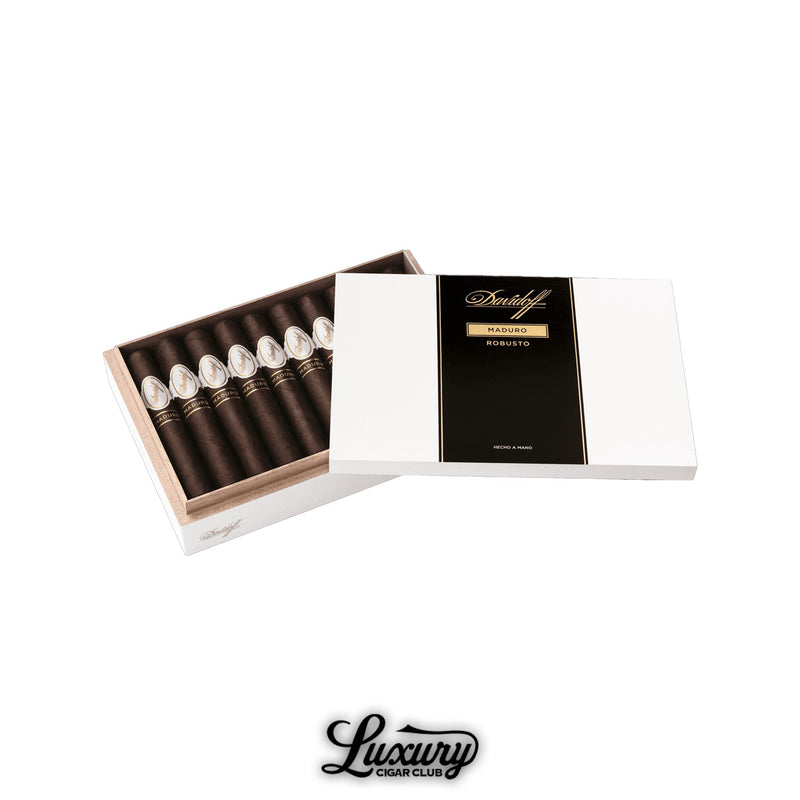 Open white Davidoff cigar box with black and gold label displaying Maduro Robusto, showing neatly arranged dark brown cigars inside, Luxury Cigar Club branding