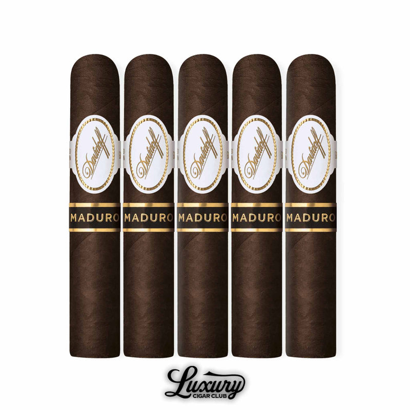 Five Davidoff Maduro Short Corona cigars aligned side by side, featuring dark brown Maduro wrapper with white and gold Davidoff band and black secondary “Maduro” band.