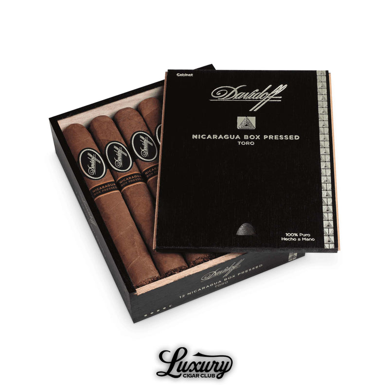 Box of Davidoff Nicaragua Box Pressed Toro cigars in black cabinet box with bold silver accent