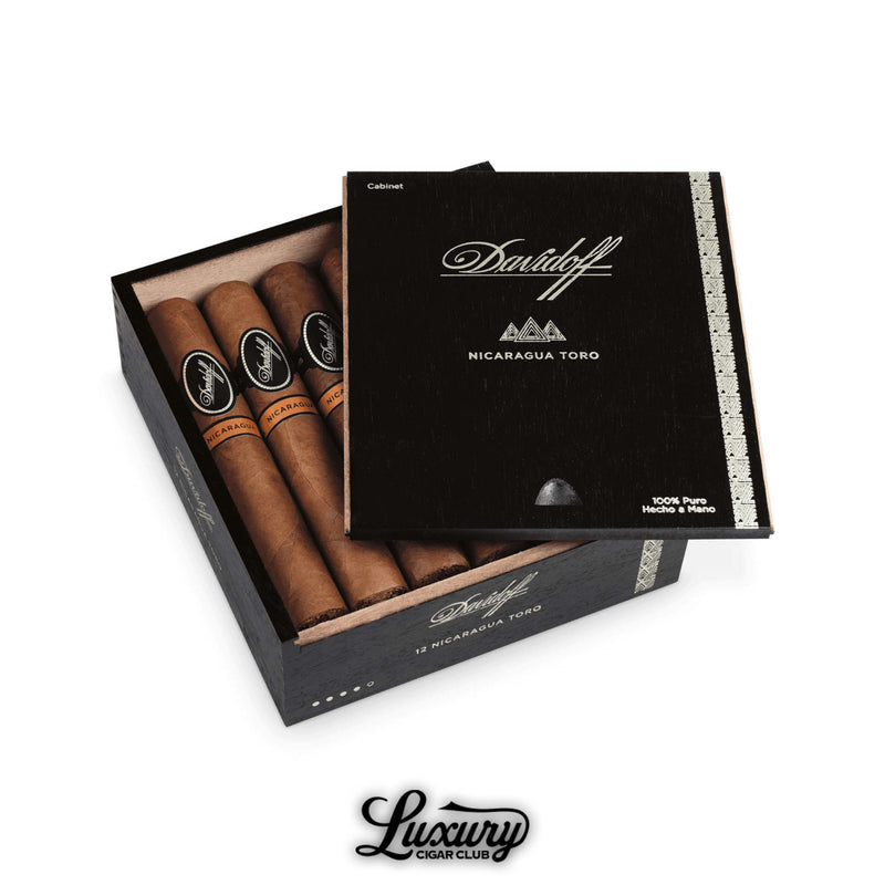 Open box of Davidoff Nicaragua Toro cigars with black and silver packaging and Luxury Cigar Club logo