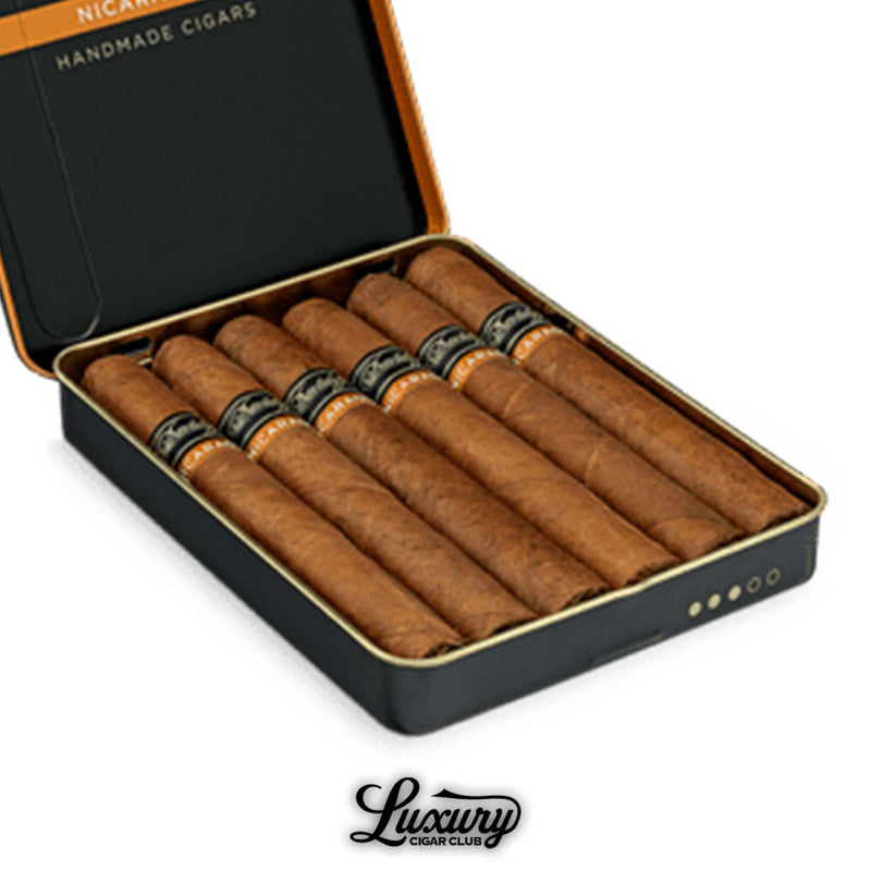 Close-up of Davidoff Primeros Nicaragua handmade cigars in black and gold tin with orange band details