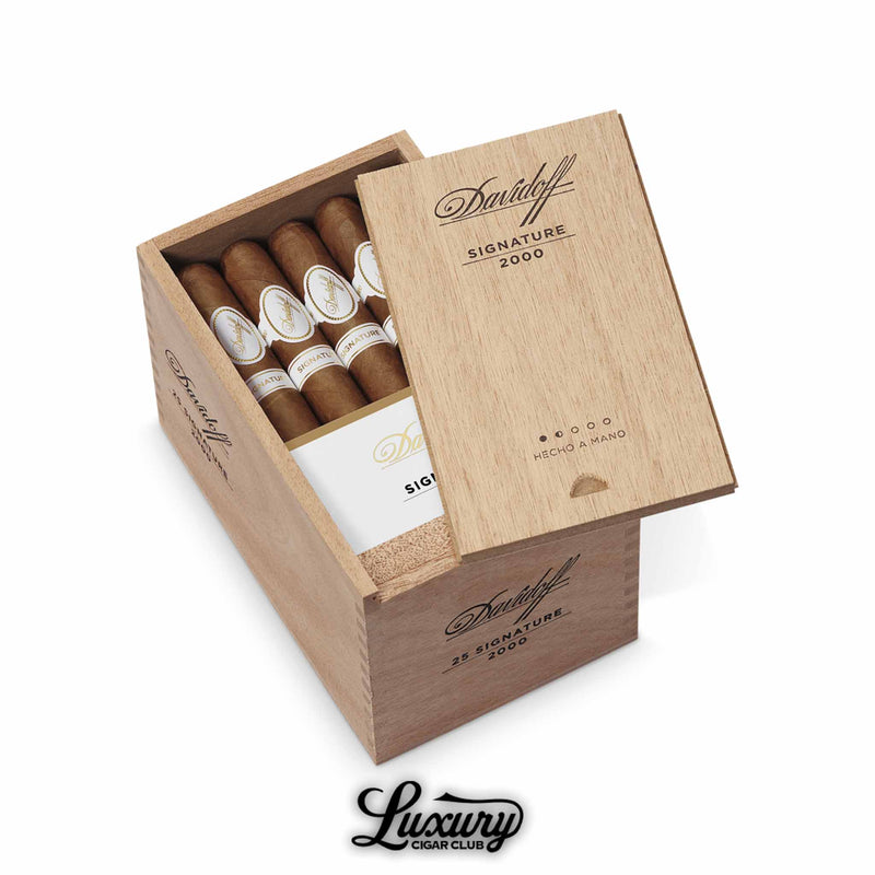 Vertical wooden box of Davidoff Signature 2000 cigars with sliding lid partially open, showcasing neatly packed cigars with white and gold bands, photographed with Luxury Cigar Club branding.
