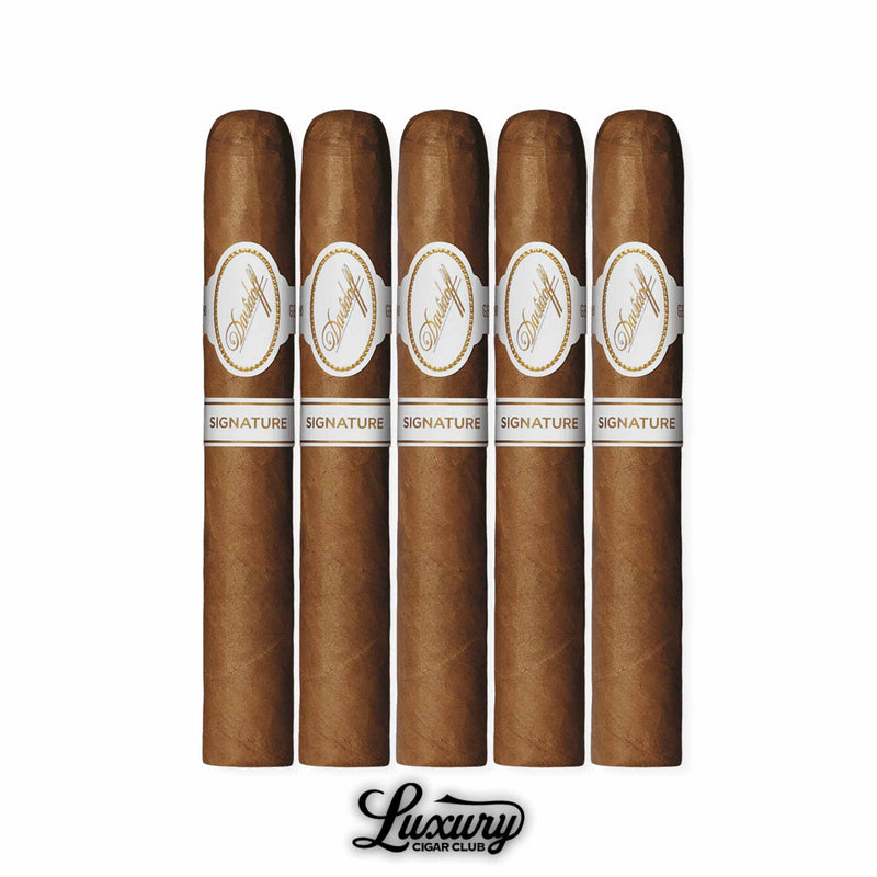 Davidoff Signature Petit Corona cigars arranged in a 5-pack, short premium cigars with Connecticut wrapper and white Davidoff band, highlighted with Luxury Cigar Club branding below.
