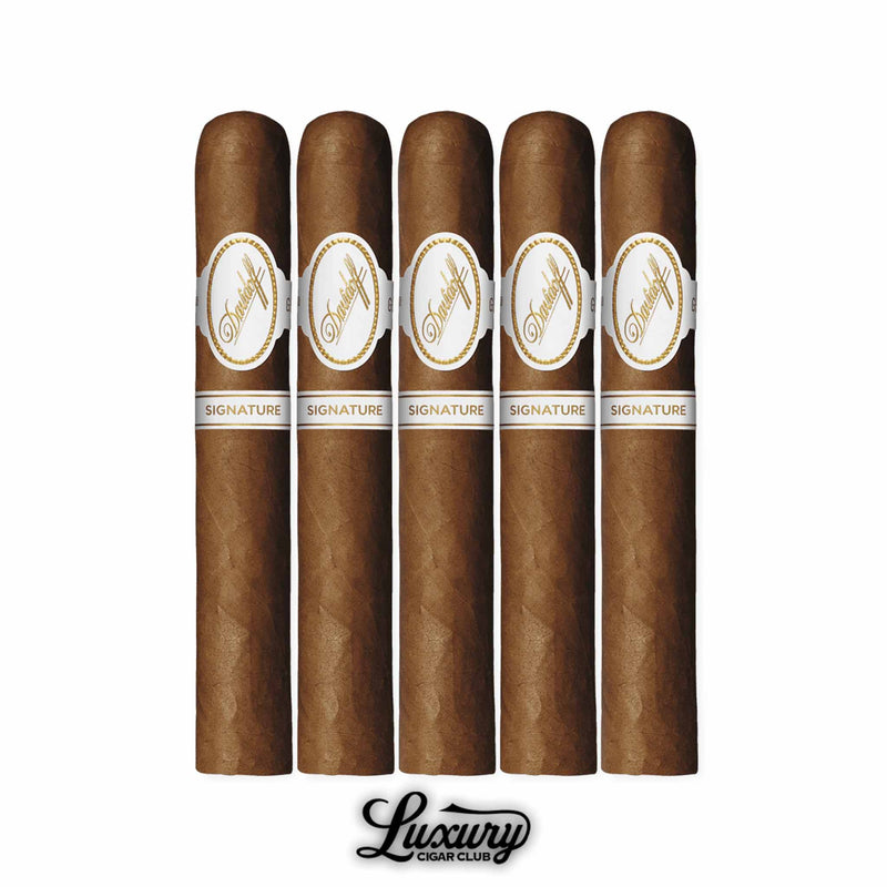 Five Davidoff Signature Toro cigars in a box-pressed style, medium brown Connecticut wrappers with elegant Davidoff bands, arranged upright with Luxury Cigar Club logo beneath.