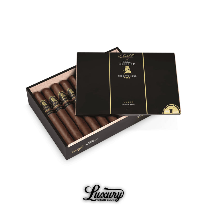 Open box of Davidoff Winston Churchill The Late Hour Toro cigars with black and gold bands, accompanied by a matching black lid with gold accents, placed on a white background featuring Luxury Cigar Club branding.