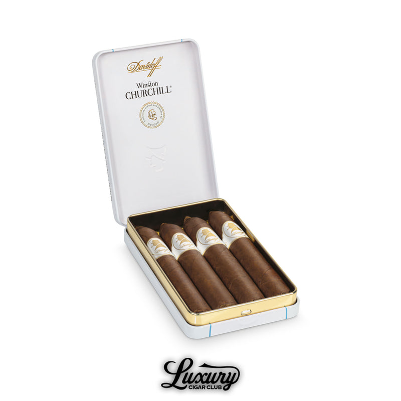 Open tin displaying Davidoff Winston Churchill Belicoso cigars with white and gold bands in a sleek case