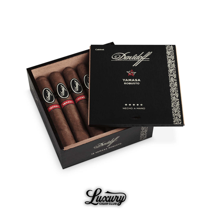 Box of Davidoff Yamasa Robusto cigars with sleek black and red branding and rich brown wrappers.