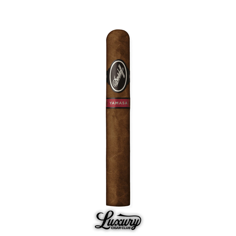 Single Davidoff Yamasa Toro cigar with a flawless dark wrapper, detailed black and silver Davidoff band, and red Yamasa band near the foot, standing upright with the Luxury Cigar Club logo below.