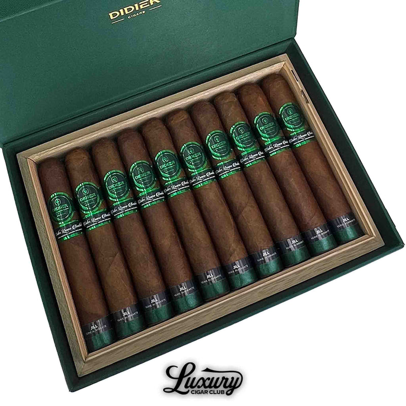 Close-up view of The Jill Serie Almirante Didier Cigars in a green box, showing detailed green and black cigar bands, with Luxury Cigar Club branding.