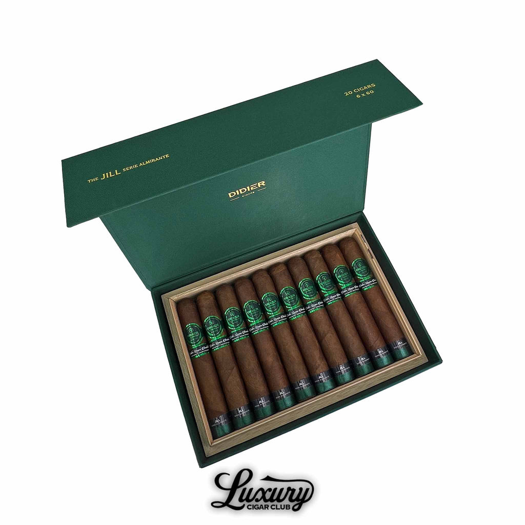 Open green Didier Cigars box labeled "The Jill Serie Almirante" containing 20 neatly arranged brown cigars with green and black bands, displayed by Luxury Cigar Club.