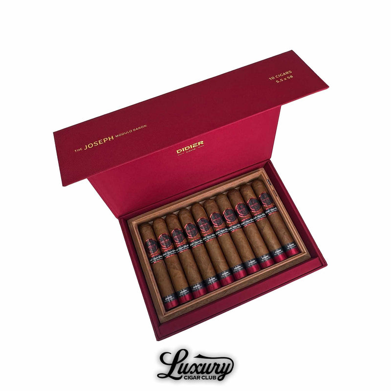 Open red Didier Joseph cigar box displaying 10 premium cigars with black and red bands, arranged neatly in a cedar-lined interior.