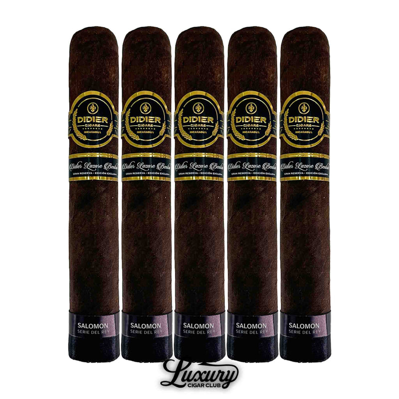 Close-up of five Didier Salomon Serie Del Rey cigars with dark brown wrappers, black foot bands, and black-and-gold main bands.