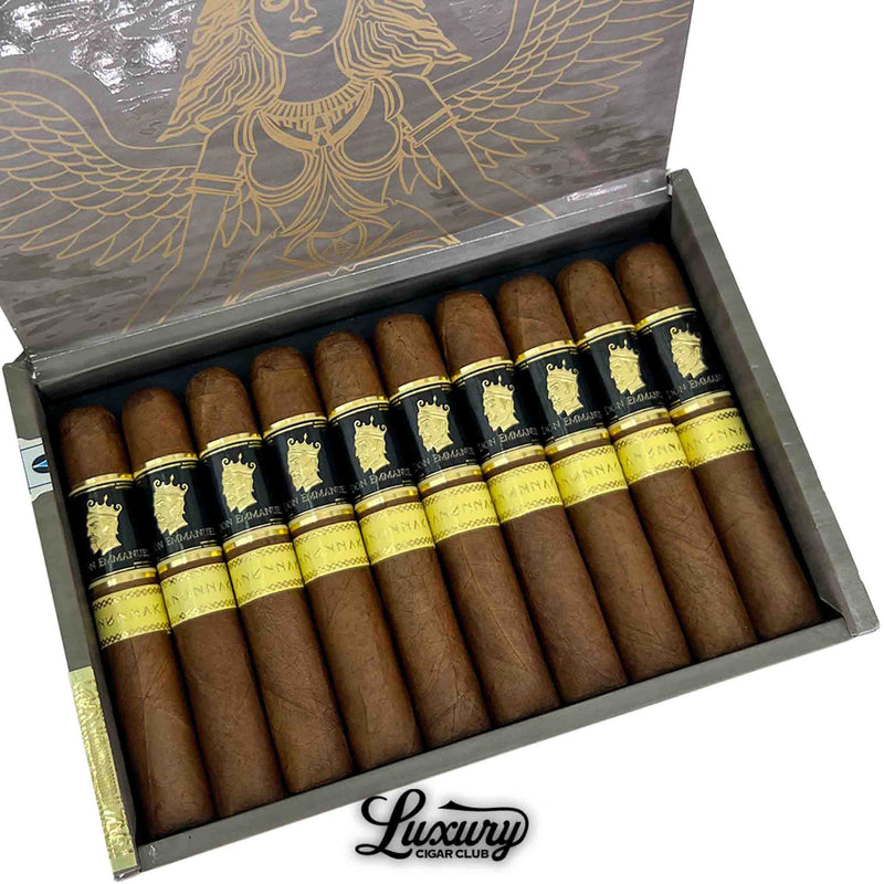 Close-up view of open box of Don Emmanuel Anunnaki Ki cigars with golden goddess artwork inside the lid and cigars lined in rows, part of Luxury Cigar Club collection.