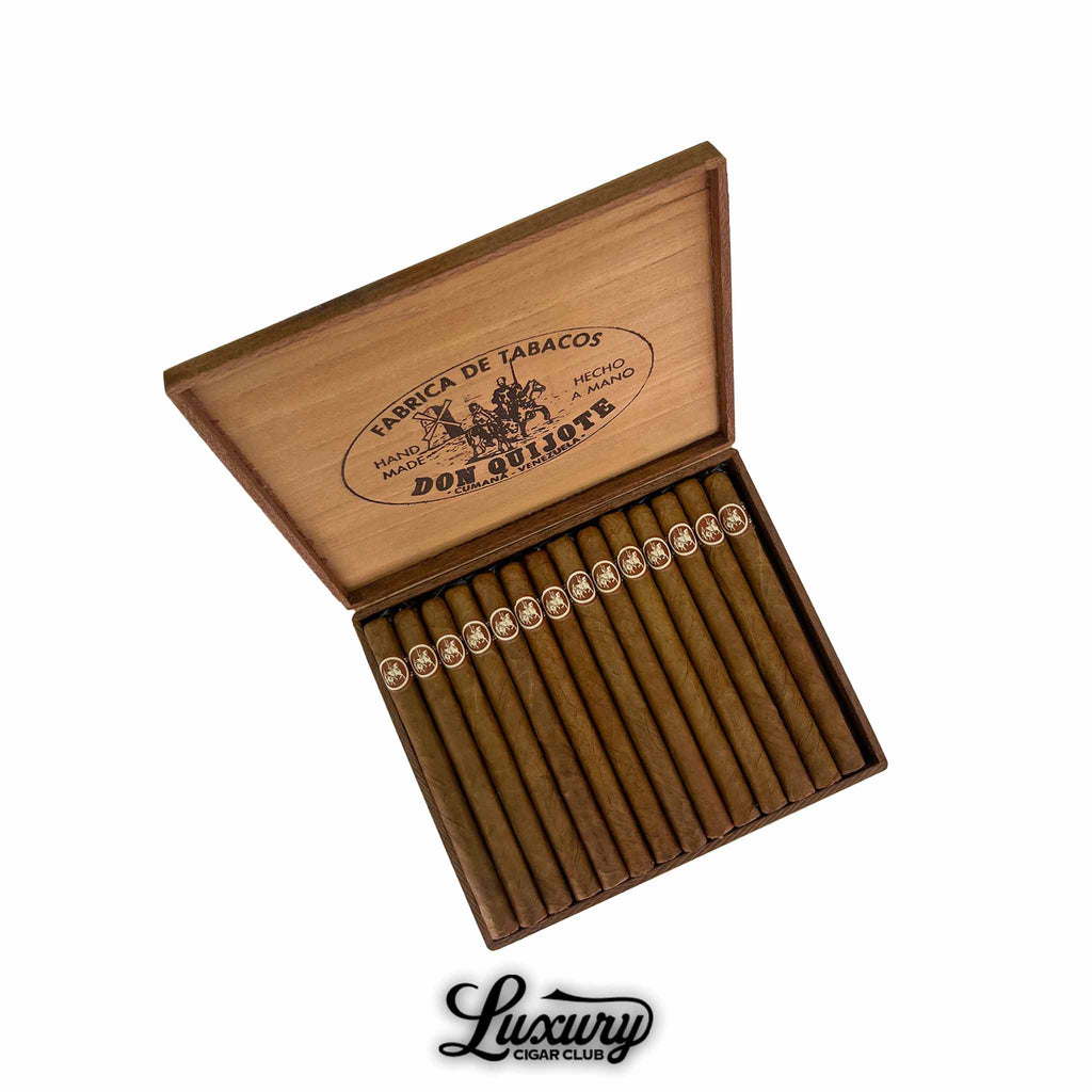 Open box of Don Quijote Carolinas cigars with light brown wrappers and brown bands, arranged neatly in wooden box, Luxury Cigar Club logo