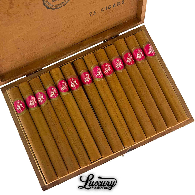 Close-up of Don Quijote No. 5 cigars in open wooden box with light brown wrappers and pink bands, Luxury Cigar Club logo