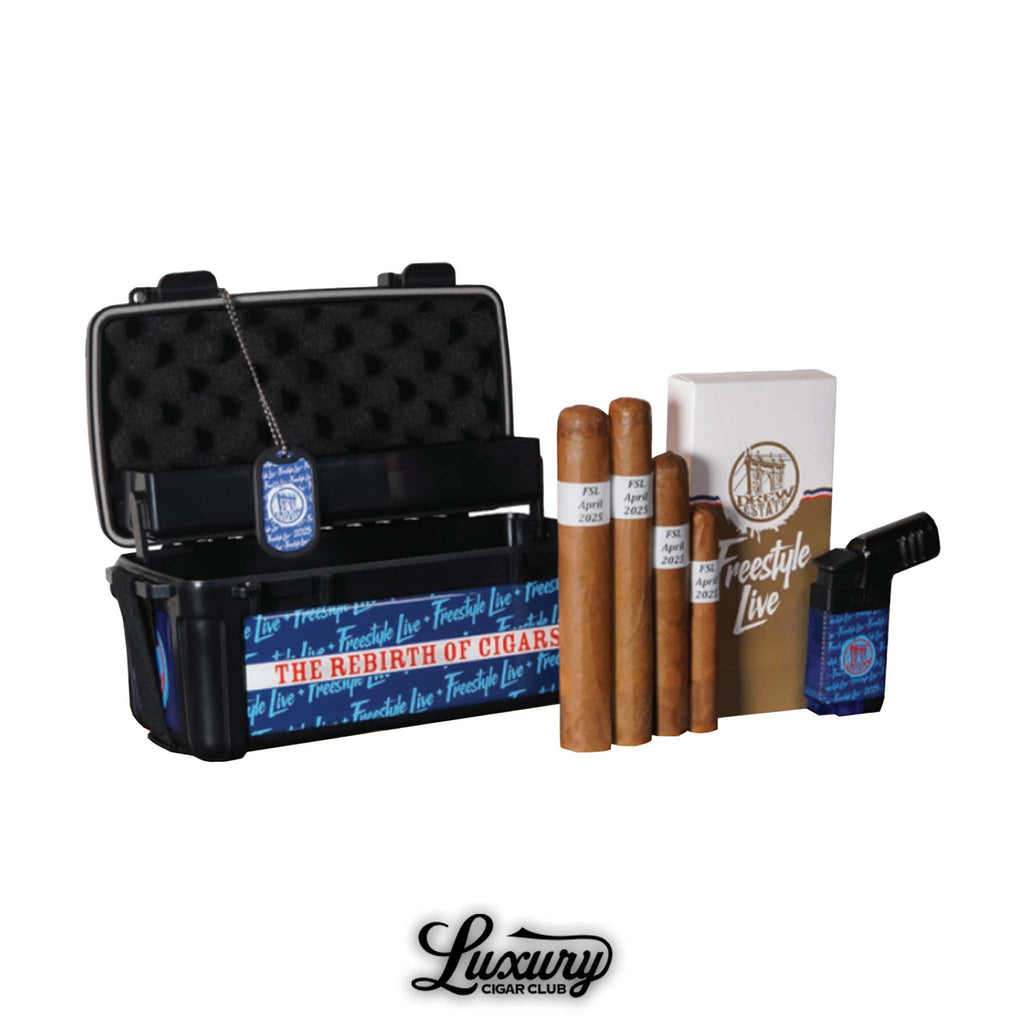 Drew Estate Freestyle Live Pack 2025 cigar sampler featuring cigars, branded accessories, and travel case displayed with the Luxury Cigar Club logo.