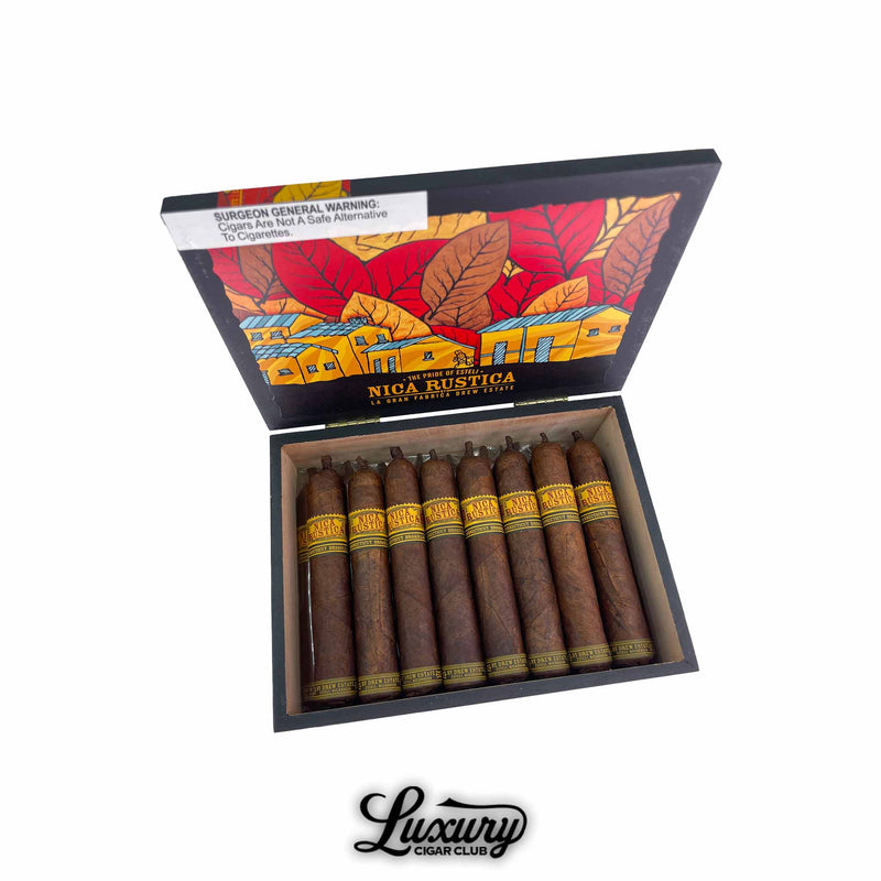 Box of Drew Estate Nica Rustica Connecticut Broadleaf Short Robusto cigars displayed open showing dark rustic cigars with yellow and black bands set inside colorful box art from Esteli Nicaragua Luxury Cigar Club