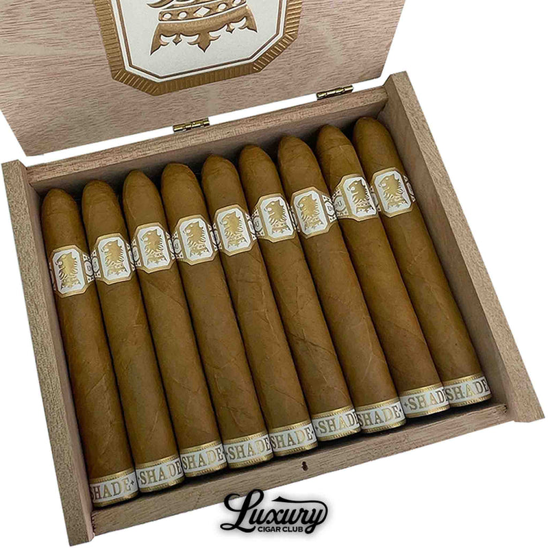 Close-up of Drew Estate Undercrown Shade Belicoso cigars showing smooth, light wrappers and precision-rolled tips, elegantly presented by Luxury Cigar Club.