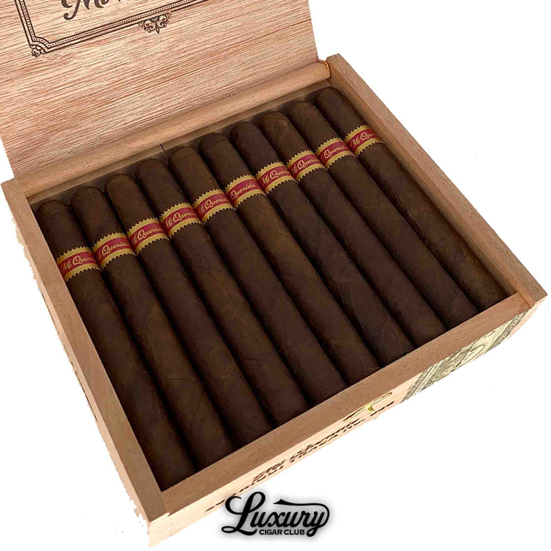 Close-up of Dunbarton Tobacco & Trust Mi Querida Triqui Traca No. 652 cigars arranged neatly in a natural wood box, highlighting the deep brown wrapper and striking red-and-gold cigar bands. Luxury Cigar Club logo beneath.