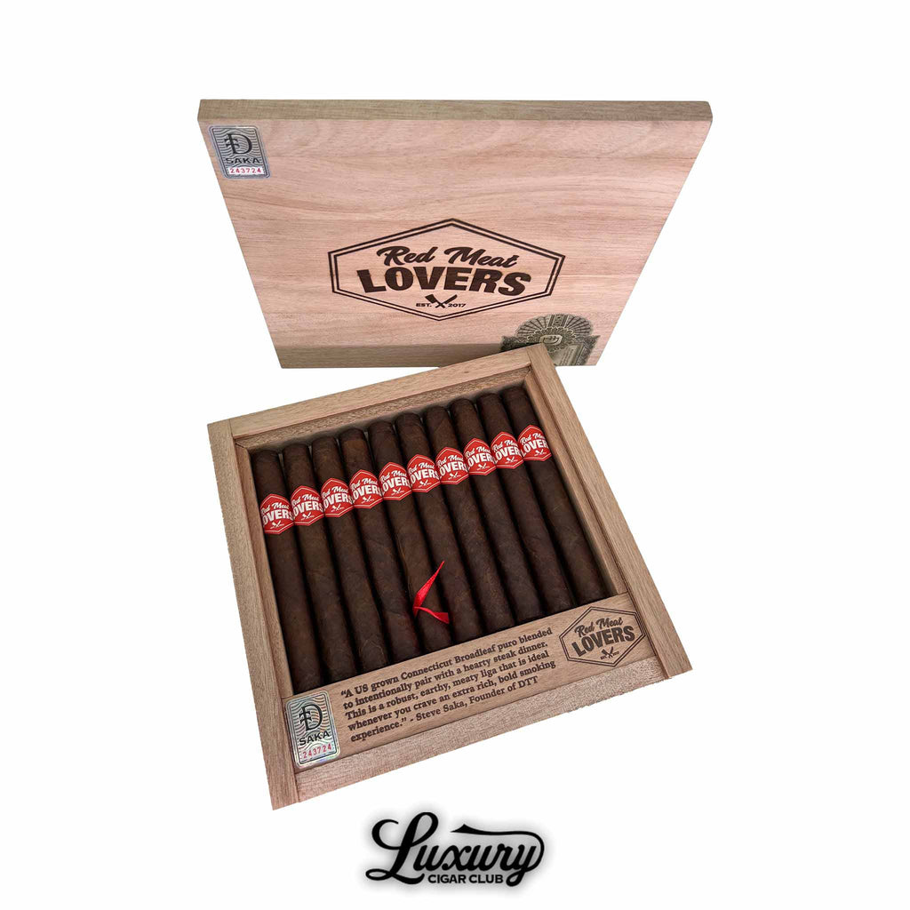 Open box of Dunbarton Tobacco & Trust Red Meat Lovers Beef Stick cigars with dark brown wrappers and red bands, wooden lid displayed, Luxury Cigar Club logo
