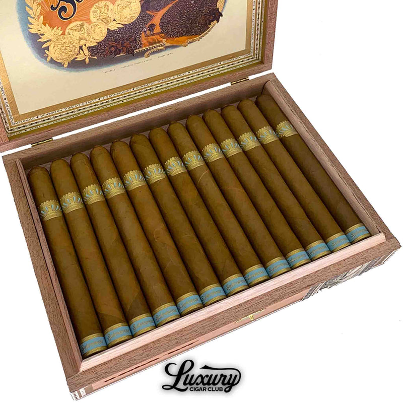 Close-up of Dunbarton Tobacco & Trust Sobremesa Brûlée Blue cigars highlighting the smooth Connecticut Shade wrappers and detailed blue-gold bands, featured by Luxury Cigar Club.