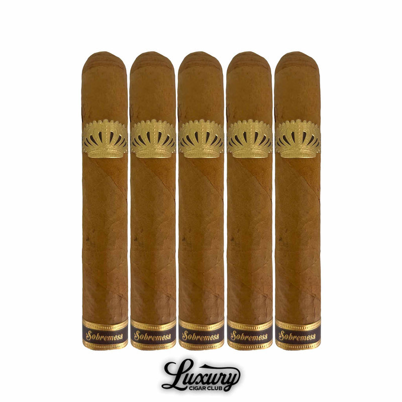 Five Dunbarton Tobacco & Trust Sobremesa Brûlée Robusto cigars aligned side-by-side, highlighting their silky Connecticut Shade wrappers and elegant gold bands. Luxury Cigar Club logo below.