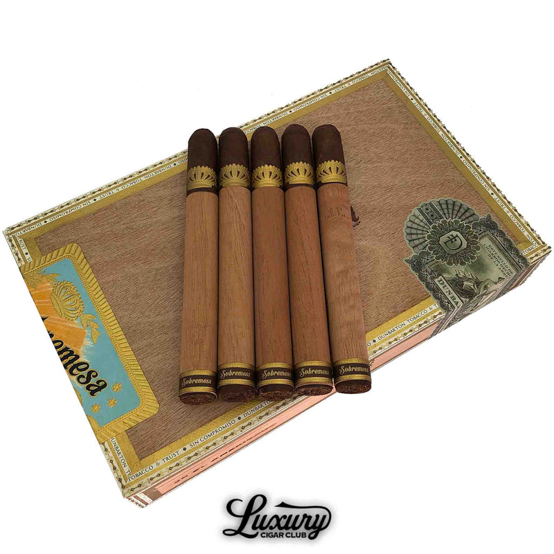 Close up of Dunbarton Tobacco & Trust Sobremesa Solita El Americano five cedar wrapped cigars resting on top of branded cigar box, highlighting wrapper texture and gold Sobremesa bands, presented by Luxury Cigar Club.