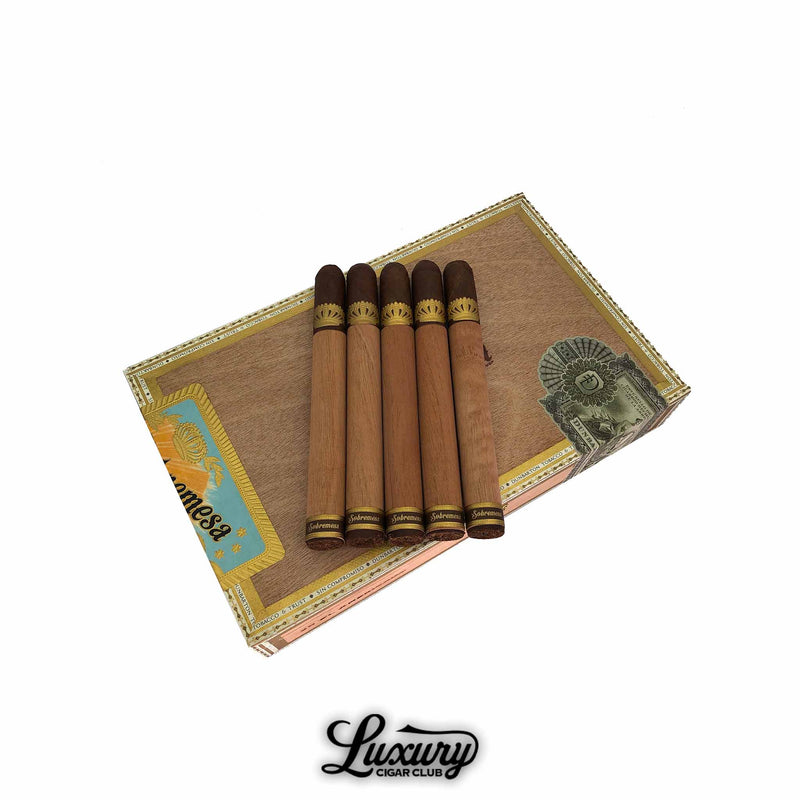 Box of Dunbarton Tobacco & Trust Sobremesa Solita El Americano cigars with five cedar wrapped cigars placed on top showing brown caps and gold embossed bands, displayed for sale at Luxury Cigar Club.