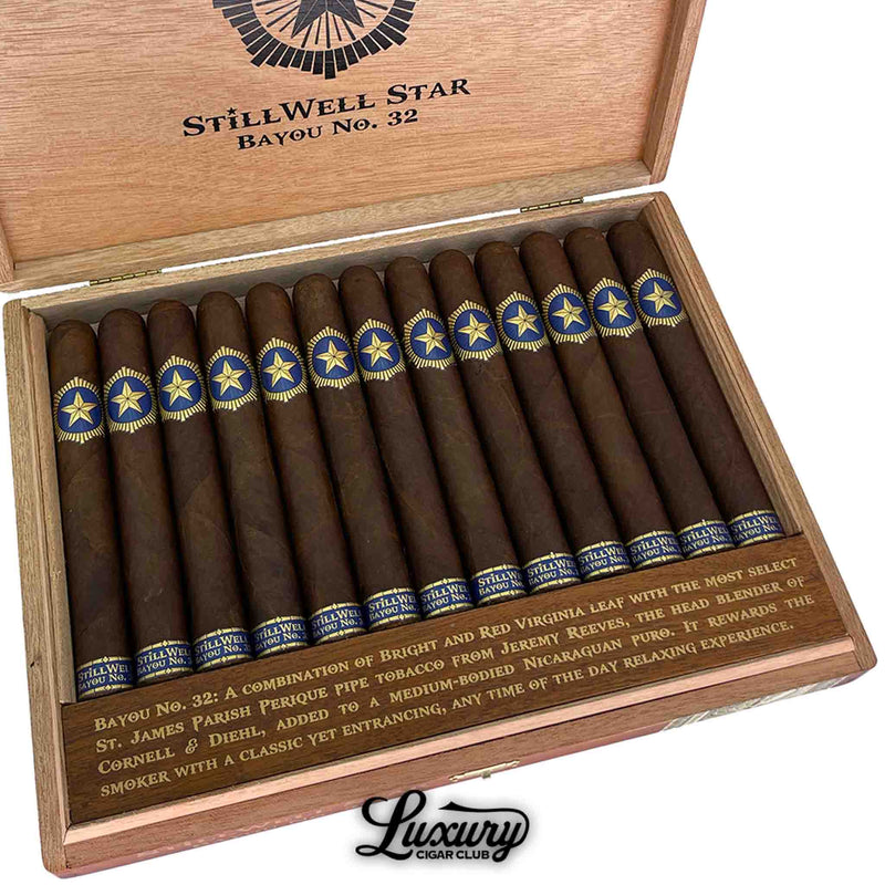 Close up of Dunbarton Tobacco and Trust StillWell Star Bayou No 32 cigars in a cedar box at Luxury Cigar Club