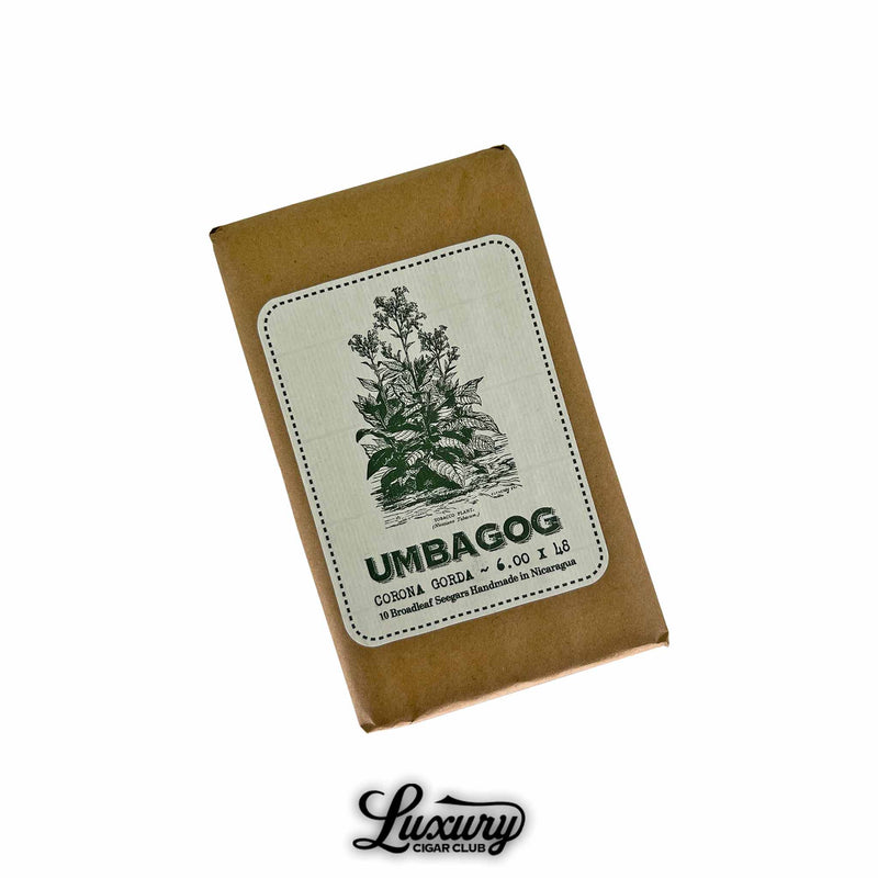 Dunbarton Tobacco & Trust Umbagog Corona Gorda Cigars Pack. Brown paper bundle of 10 Umbagog Corona Gorda cigars (6 x 48) with a white and green tobacco plant label, handmade in Nicaragua, from Luxury Cigar Club.