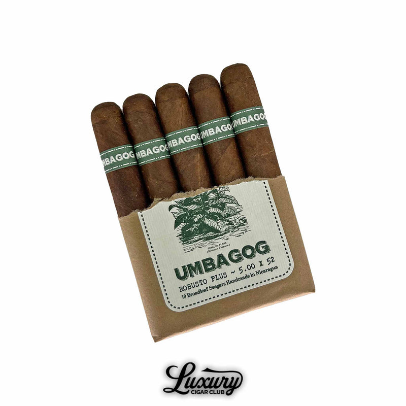 Dunbarton Tobacco & Trust Umbagog Robusto Plus cigars in open bundle with Luxury Cigar Club logo. Five Robusto Plus cigars partially exposed from brown paper pack, each with green and white Umbagog band, Luxury Cigar Club branding below.