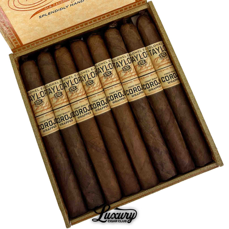 Close-up view of E.H. Taylor Corojo Corona cigars inside an open box, showcasing detailed Corojo wrappers and vintage-style cigar bands.