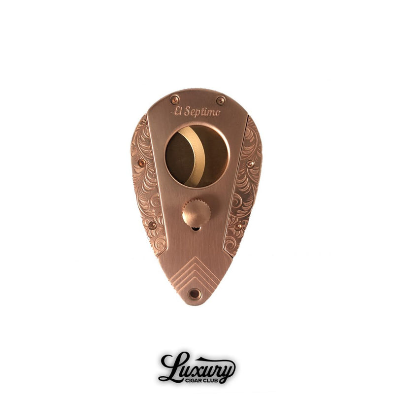 El Septimo rose gold double bladed guillotine cutter for cigars featured at Luxury Cigar Club.